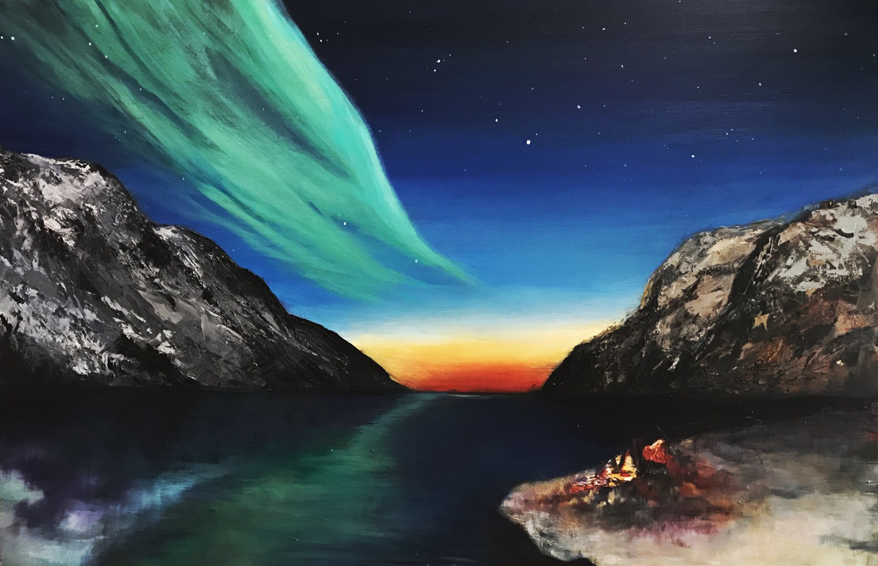 A green aurora sweeping over a Norwegian fjord and a small bonfire