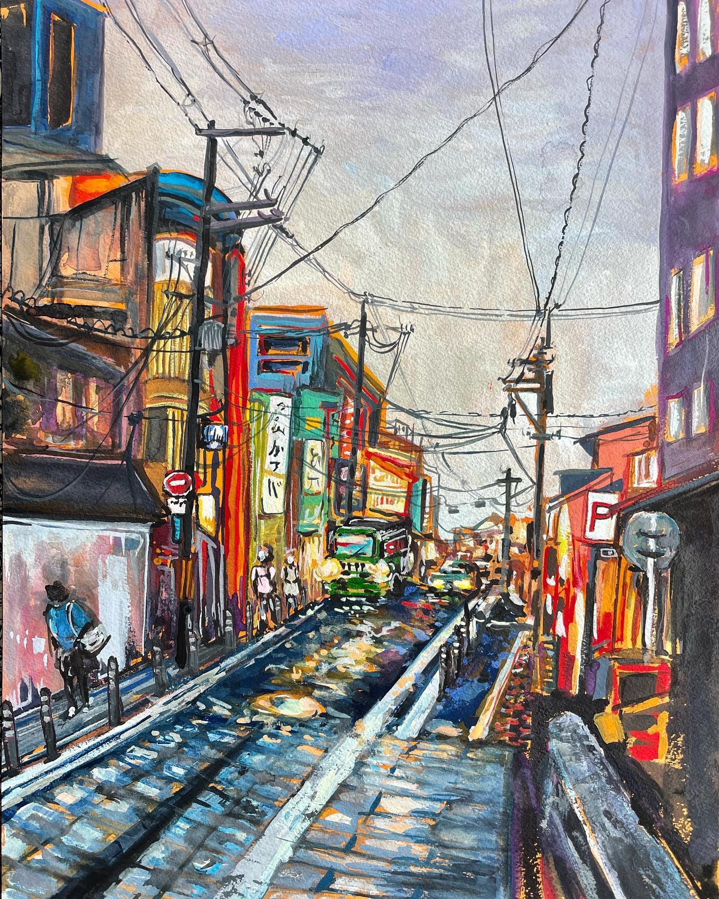 Kyoto, Japan streetscape with wet railway tracks