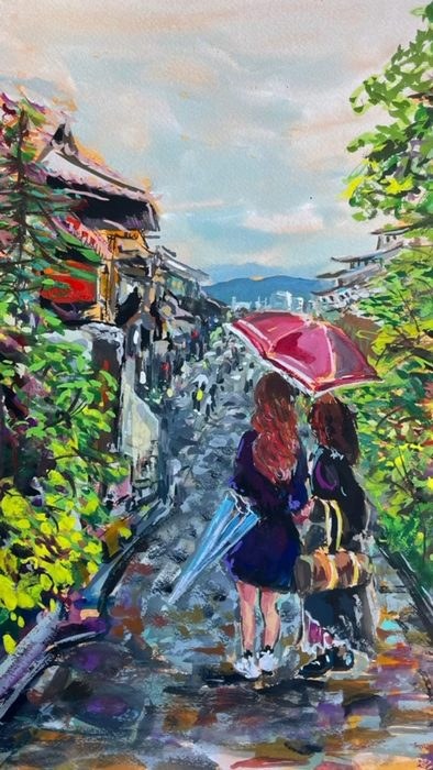 Kyoto, Japan lane with two figures under a red umbrella