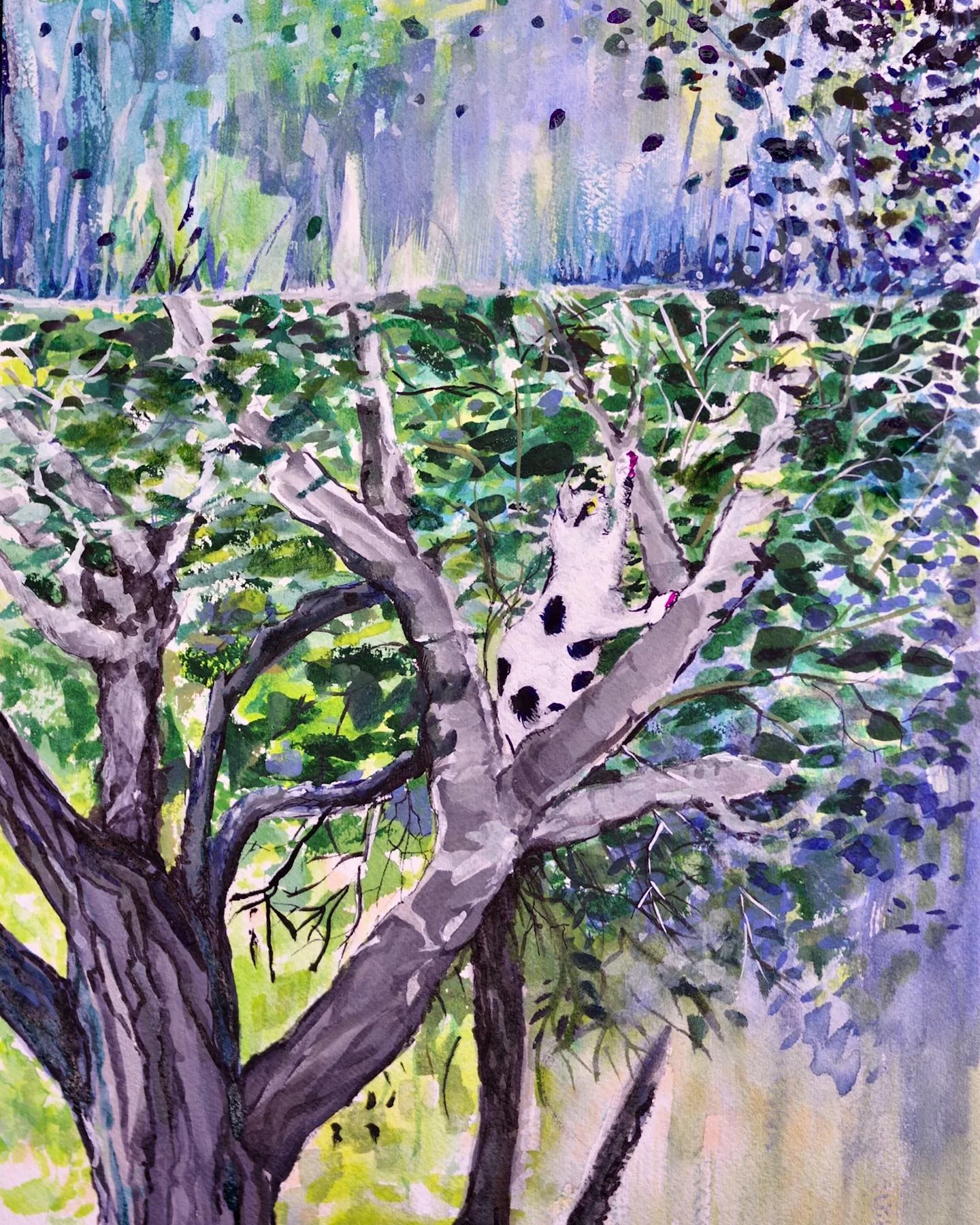 Cat in a flowering fantastical tree