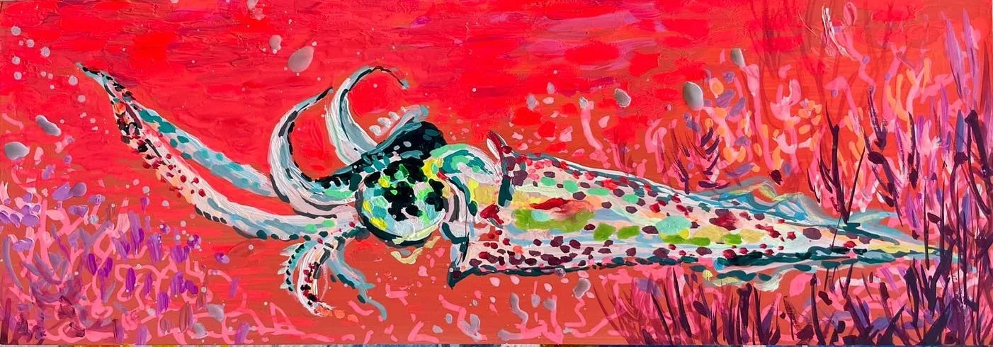 Neon squid in a coral-red underwater scene